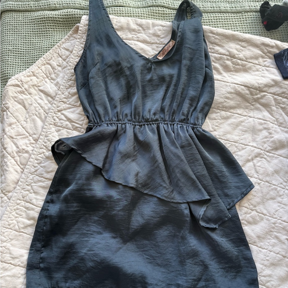 Elegant Sleeveless Peplum Dress